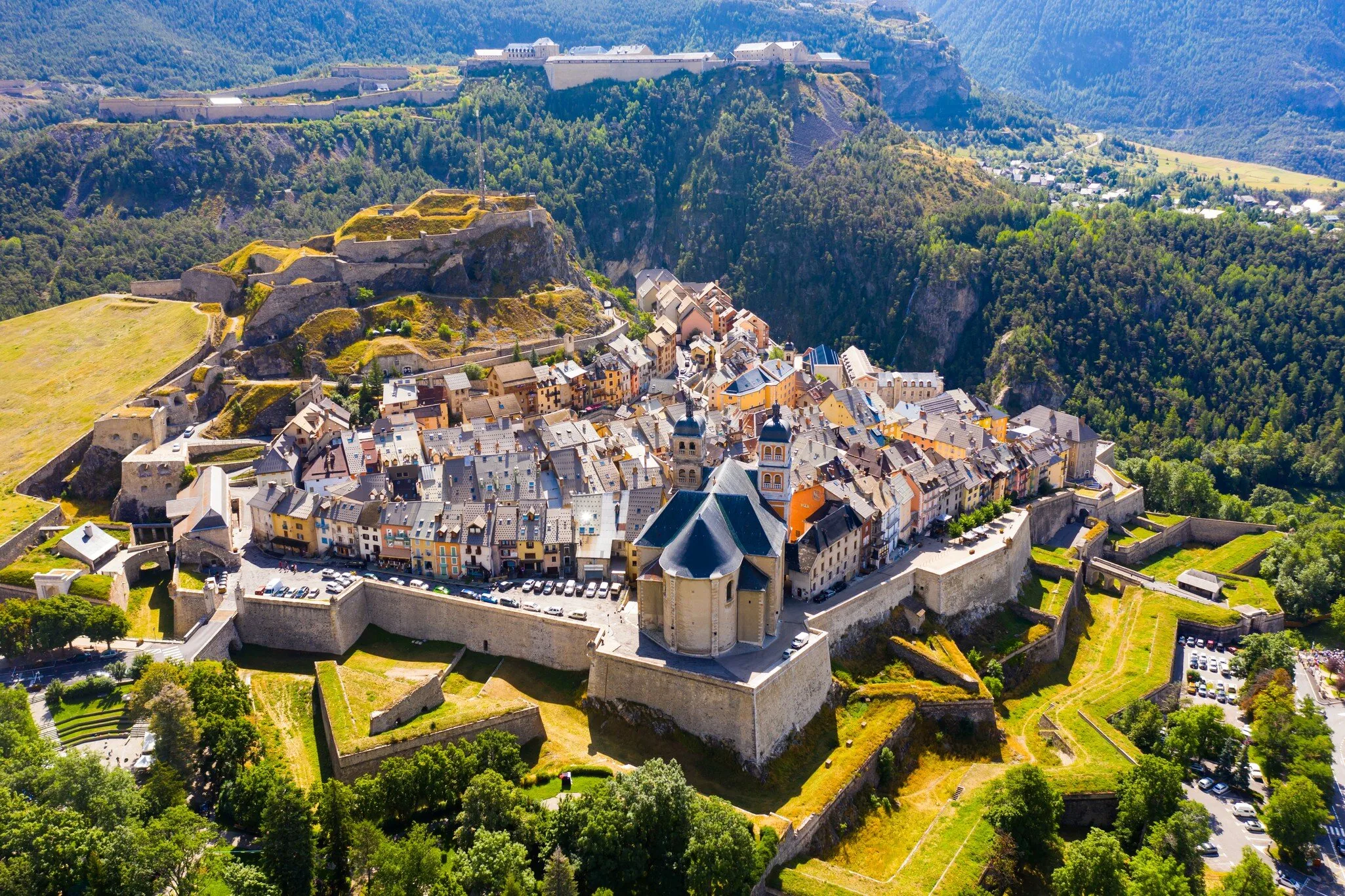 Aerial view across the fortified old town of Briançon and its surrounding mountains